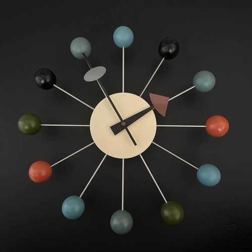 Horloge murale billes - à,