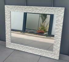 Miroir avec encadrement