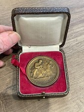 Ancienne médaille en bronze