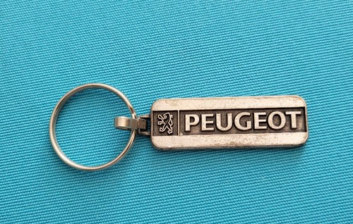 Ancien porte clé peugeot - porte,
