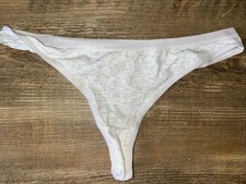 string femme porté, spéciale