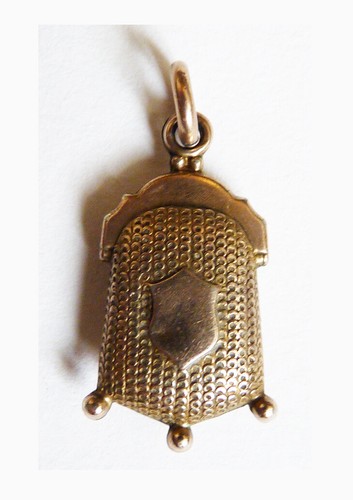 Pendentif forme bourse - en,