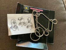 Casse tête métal, jeu