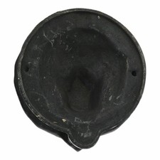 Tête de lion face porte