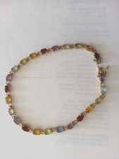 Bracelet or 18 carats serti de pierres fines