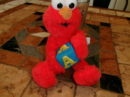 Ancienne peluche elmo 2009 - peluche,