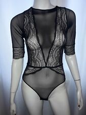 Magnifique body tres sexy transparente et dentelle,taille s,xs