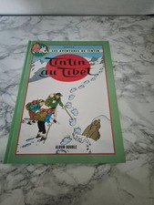 1 album double « Tintin au