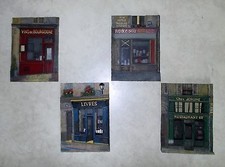 SET OF 4 DECORATIVE CERAMIC 3-D ARTISAN WALL PLAQUES OF FRENCH SHOPS - NEW