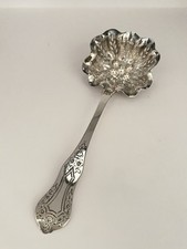 Cuillère à saupoudrer en