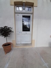 Grande porte d’entrée avec vitrail art deco