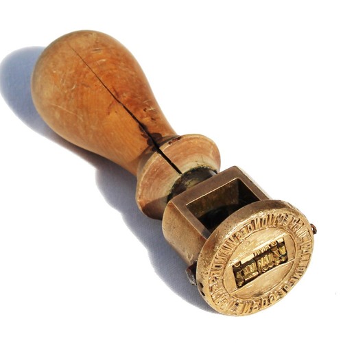 Ancien tampon mécanique - , en