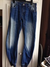 Jean bleu Primark garçon jambes nœud 12-13 avec chevilles élastiquées