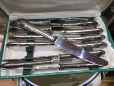 12 grands couteaux metal