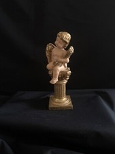 Ange, chérubin, putto, assis