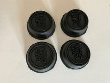 4 enjoliveurs centres de roue cache moyeu peugeot 205 106