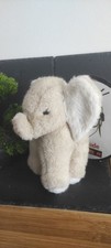 peluche ancienne éléphant gris blanc standing aux nations beige marron rond 