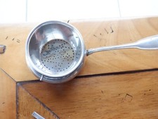 Ancienne passoire à thé