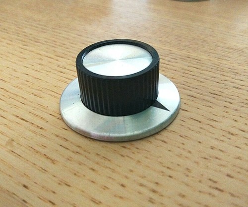 Gros bouton triangle - bouton,