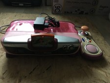 console vsmile motion vtech rose avec jeux dora motion vf testé et fonctionnelle