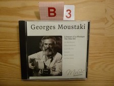CD : L 'Amour à La Musique . The Hits Live - GEORGES MOUSTAKi / 16 TiTres / TBE