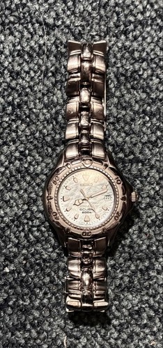 Montre seiko titanium - montre,