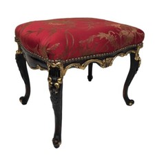 Tabouret en bois sculpté et laqué noir et or, de style Louis XV