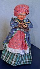 Poupée porcelaine biscuit musicale et automate