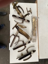 Lot de poignées rustiques portes et fenêtres. Laiton massif. Très bon état.  