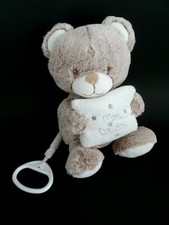 *. PELUCHE MUSICAL TEX OURS