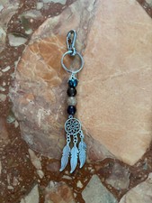 Porte clé "Attrape-rêves" avec 4 perles naturelles de 8 mm.