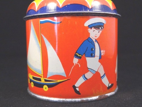 Ancien jouet mécanique tôle