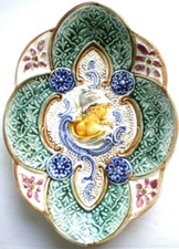Antique French Majolica ovale dish: Arabesques and Character relief