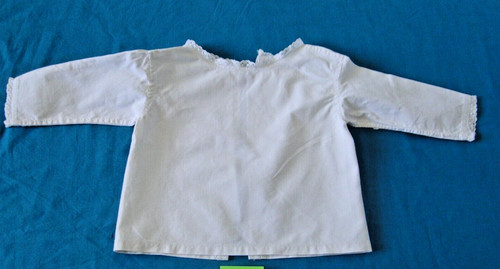 Ancienne brassière bébé