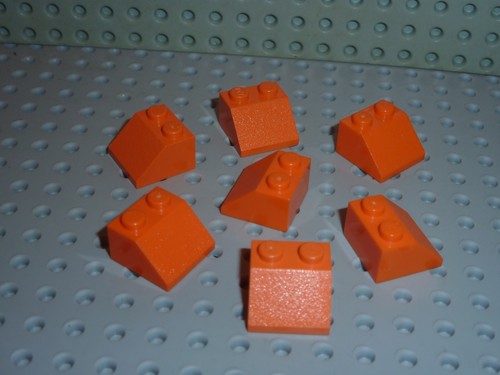 Lego orange slope brick - x,