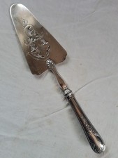 pelle à tarte métal argenté