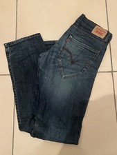 Jean Levis bleu femme taille 16 en très bon état 