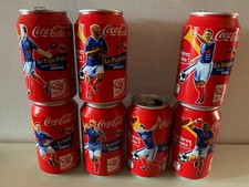 LOT 7 CANETTES COCA COLA WORLD