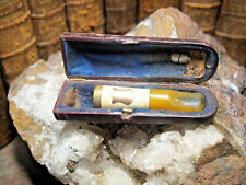 fume cigarette  en ambre et