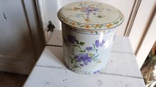 Ancienne boite ronde tôle lithographiée décor fleuri