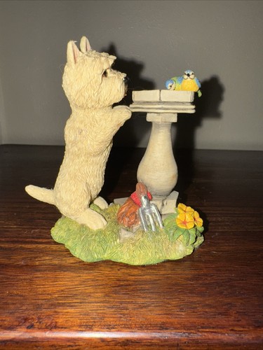 Westie and fountain figurine - and,