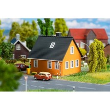 Maison à étage avec abri