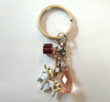 Porte Clé / Bijou de sac Licorne Cube goutte roses