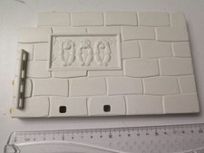 Mur en pierres blanc avec