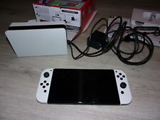 Console Nintendo switch OLED blanche avec 5 jeux