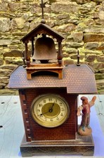 réveil, pendule automate en terre cuite horloge foret noire