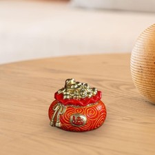 Statue de sac porte-bonheur en