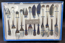 JEAN COUZON COUVERTS A POISSON