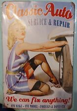 Plaque publicitaire en tôle