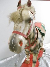 Cheval a roulettes - a,